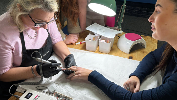 Melanie Lewendon teaching students 